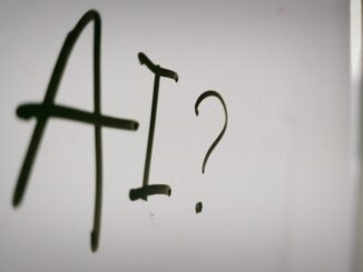 a sign with a question mark and a question mark drawn on it