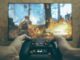 Hands holding a game controller playing a video game.