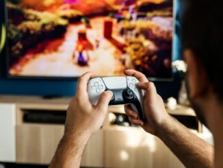 a man playing a video game on the nintendo wii