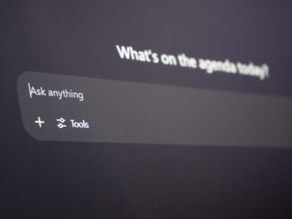 Digital interface with "ask anything" prompt.