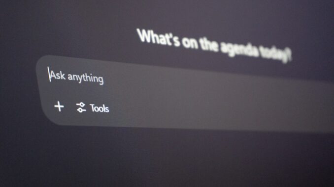 Digital interface with "ask anything" prompt.