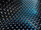 A close up view of a blue and black fabric