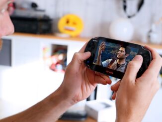 a man is playing a video game on his phone