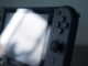 black and gray nintendo switch