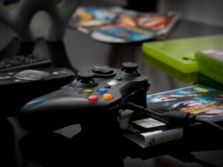 black Microsoft Xbox 360 controller