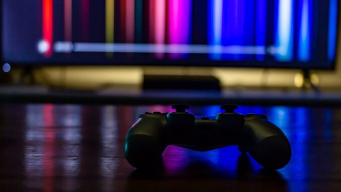 black and blue game controller