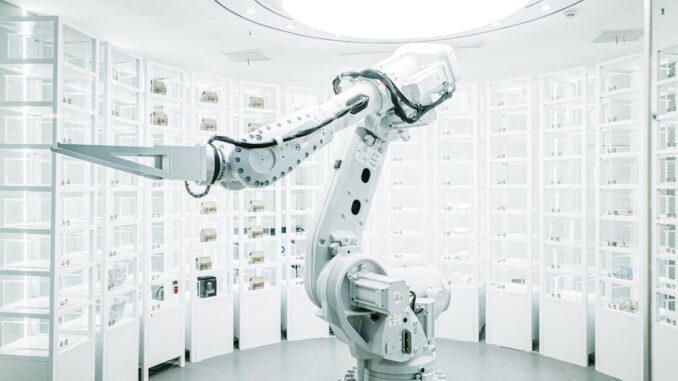 white robotic arm in display showroom