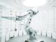 white robotic arm in display showroom