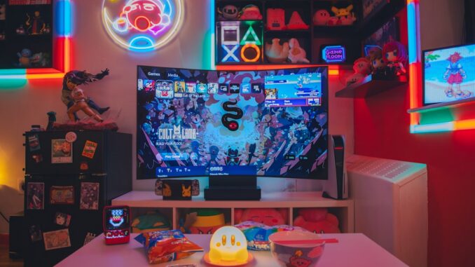 a living room with a large television and neon lights