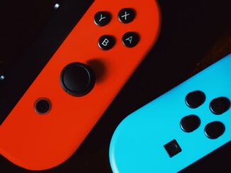 Nintendo Switch on black surface