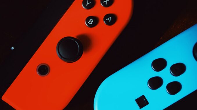 Nintendo Switch on black surface
