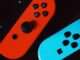 Nintendo Switch on black surface